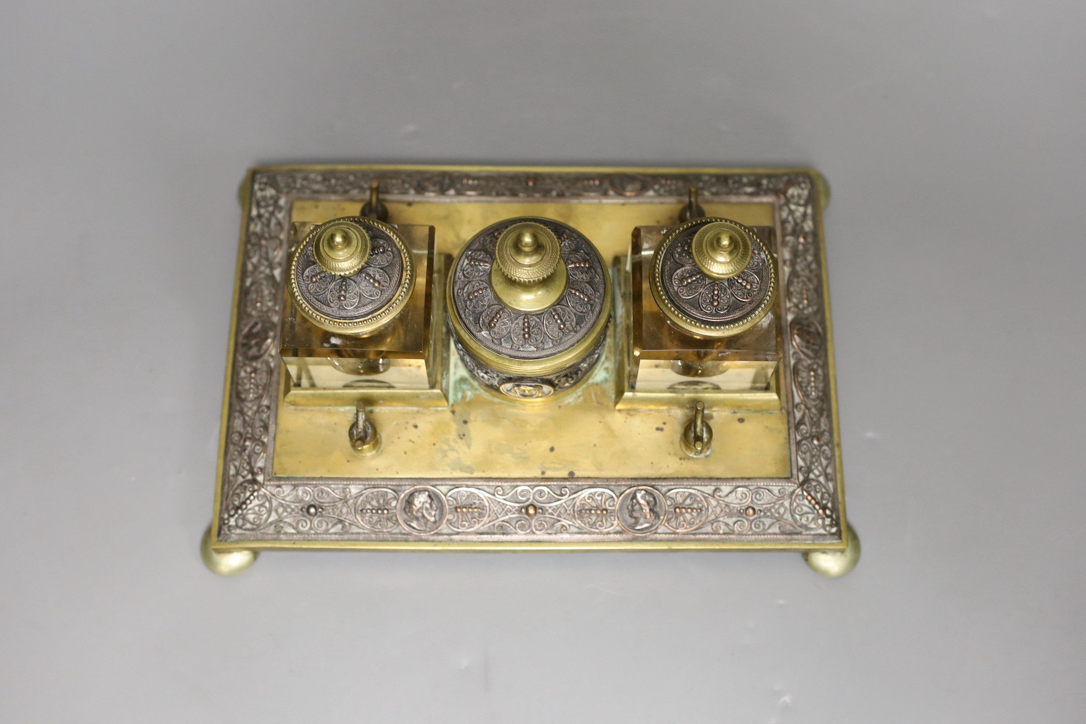 A late 19th century brass inkstand, 24cm wide